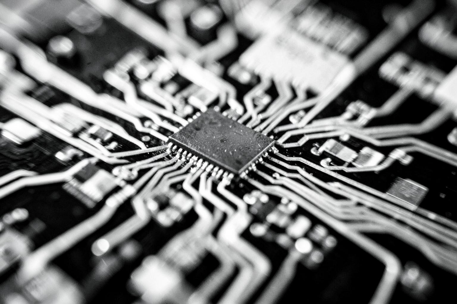 Close-up of a circuit board, captured in motion